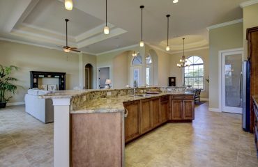 19Kitchen open to Great Room Stanley Homes Model Home Palm Coast Brevard Florida