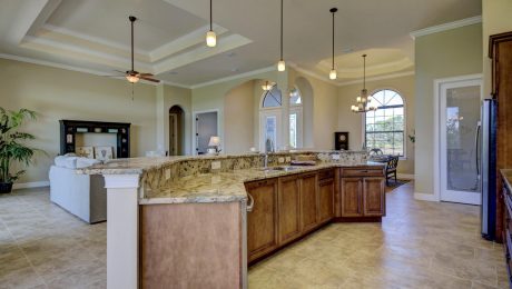 19Kitchen open to Great Room Stanley Homes Model Home Palm Coast Brevard Florida